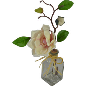 Artificial flower in glass vase